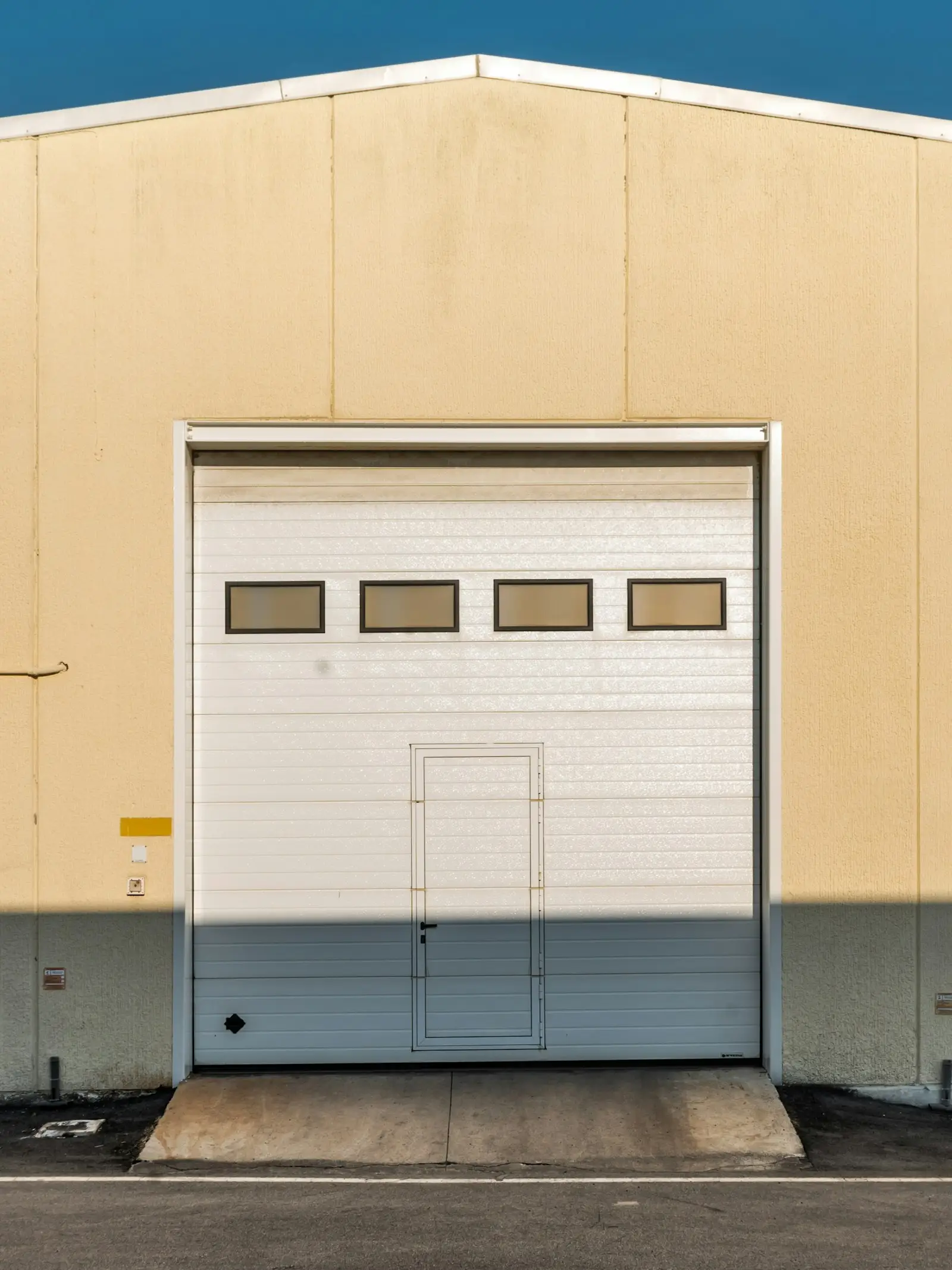 Close-up of a white sectional garage door